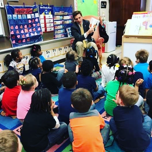 miles reading to kids